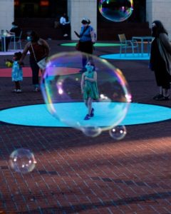 Girl with mask in a bubble